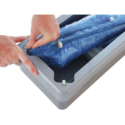 Automatische overschoen dispenser